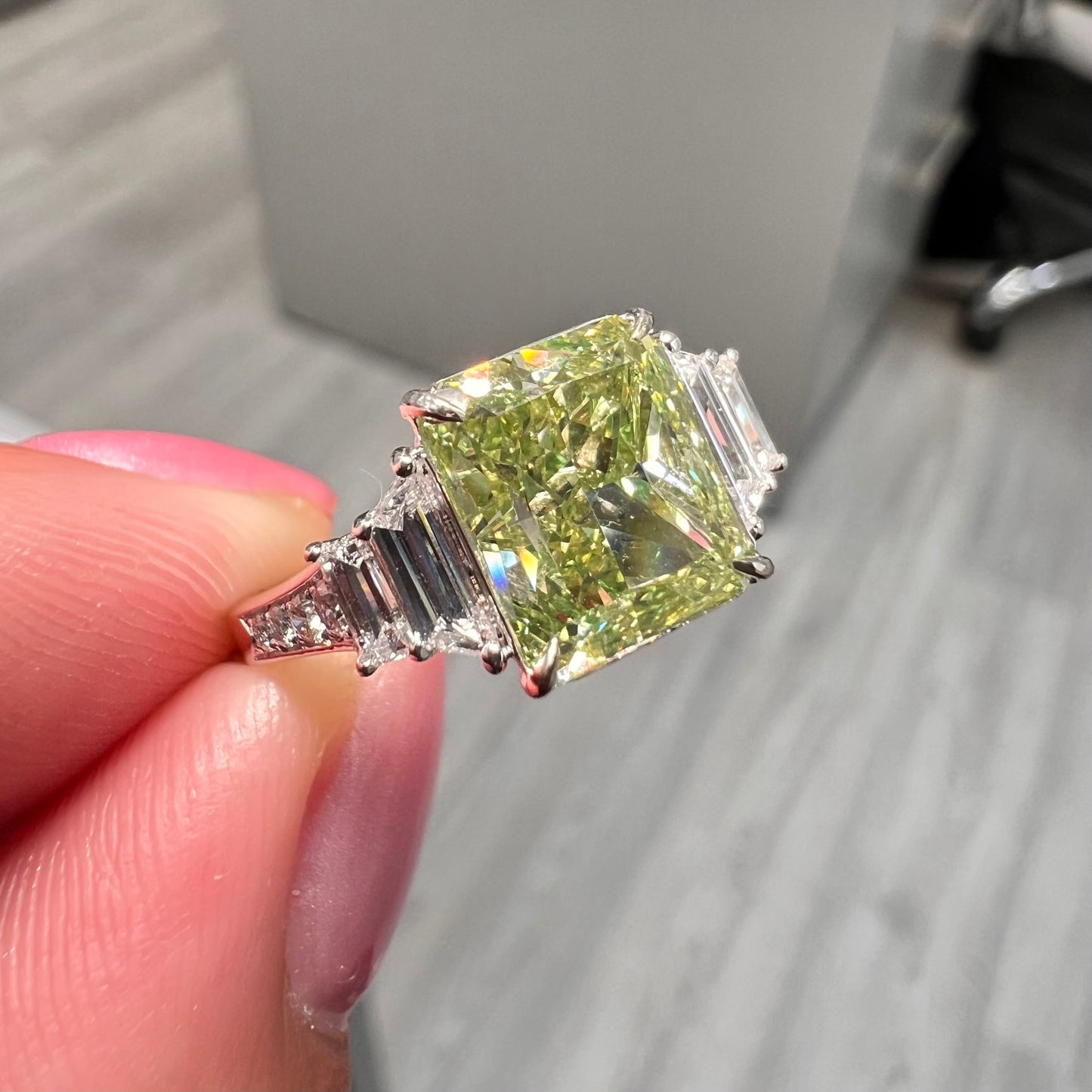Natural Green elongated radiant diamond ring. GIA green diamond. Natural green diamond. JLO green diamond ring.  Long radiant. Rectangular radiant green diamond