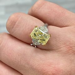 Fancy light yellow elongated radiant cut diamond ring