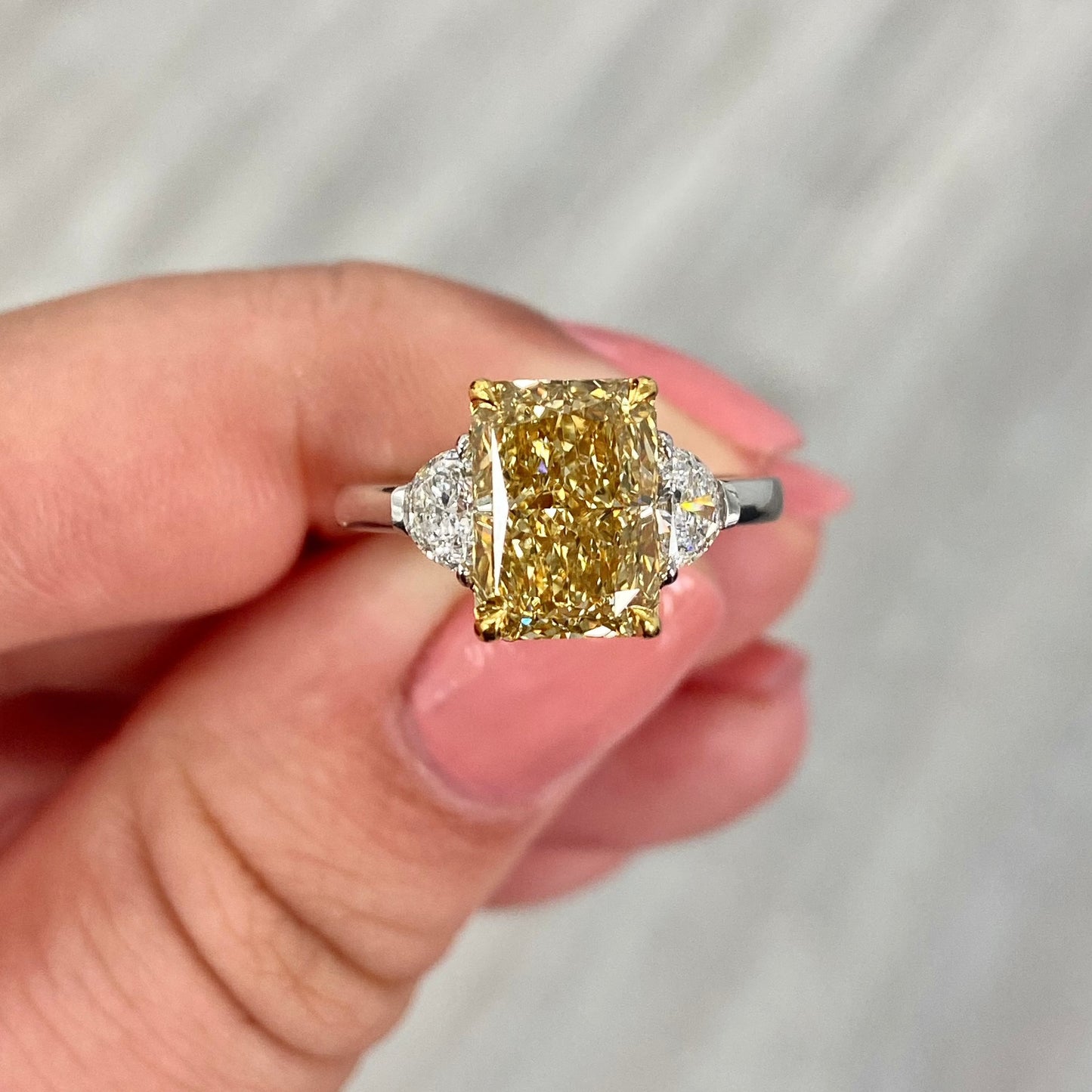 Long radiant. Long radiant yellow diamond. fancy yellow diamond ring. yellow diamond ring.