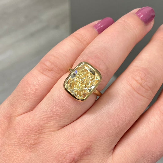 Bezel Set light yellow diamond ring. bezel engagement ring . Yellow diamond ring. Radiant cut diamond ring. 9 carat diamond ring.