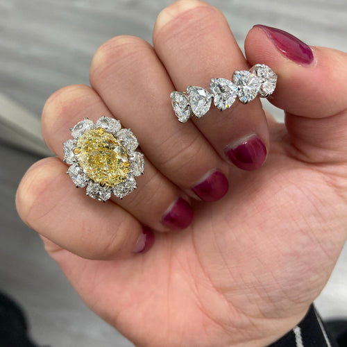 Fancy light yellow oval diamond. 7 carat yellow diamond oval shaped.