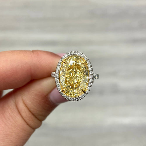 7 carat light yellow oval diamond ring