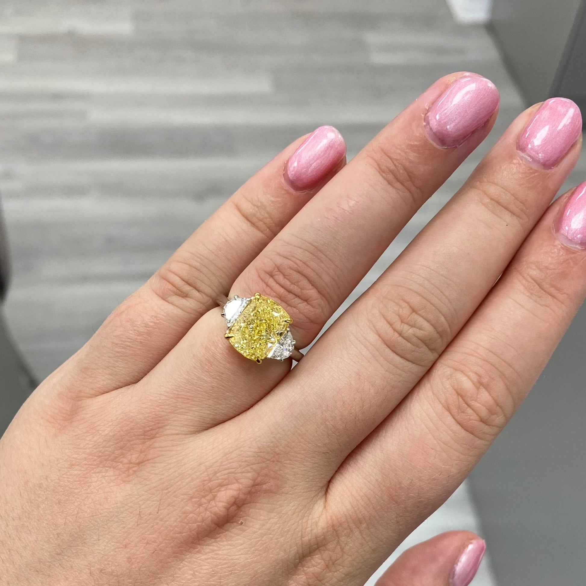Yellow diamond ring. fancy yellow ring. 5 carat yellow diamond. 5 carat yellow diamond ring. long cushion cut. long cushion yellow diamond. yellow diamonds.
