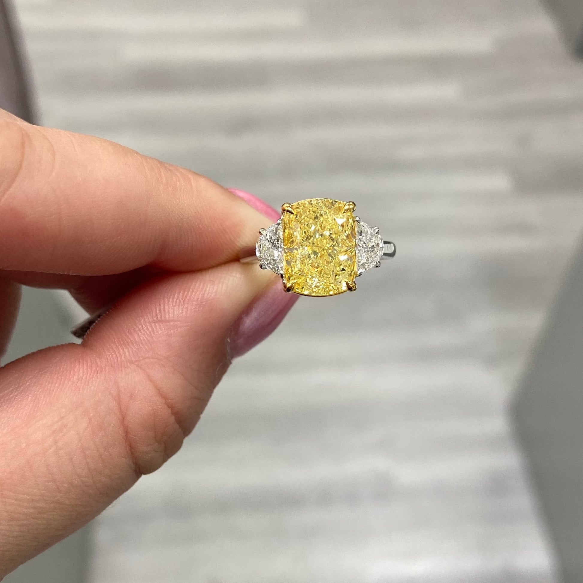 Yellow diamond ring. fancy yellow ring. 5 carat yellow diamond. 5 carat yellow diamond ring. long cushion cut. long cushion yellow diamond. yellow diamonds.