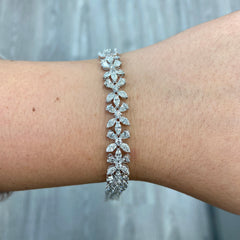 white diamond bracelet. tennis bracelet. floral diamond bracelet